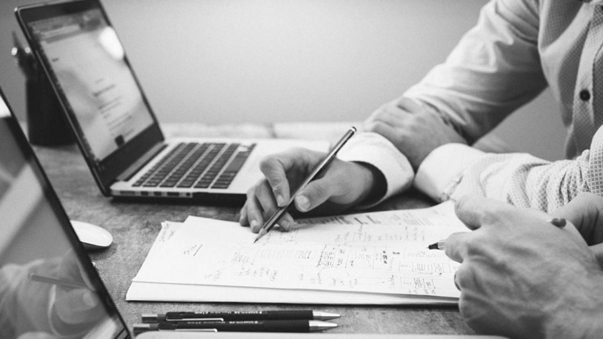 two people reviewing a document