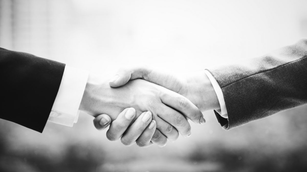 Two people shaking hands