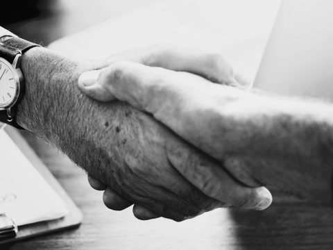 Two men shaking hands